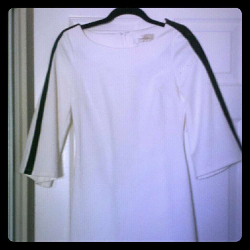 Beautiful white dress with black leather